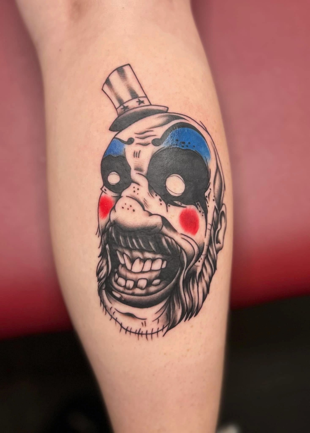 Neo-traditional color clown skull calf tattoo by CJ Upton
