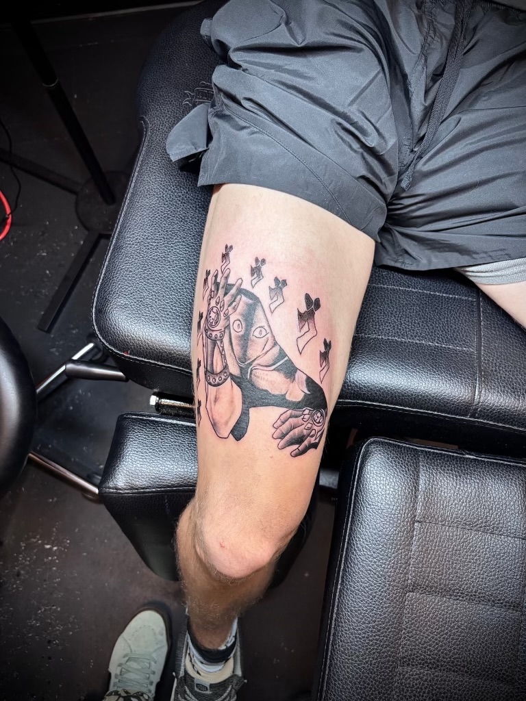Illustrative figure and moths quad tattoo by Emma Bray
